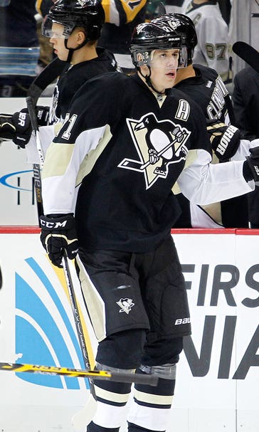 Penguins finally win first and Malkin breaks scoring drought